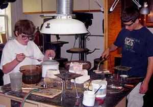 students working at soldering bench